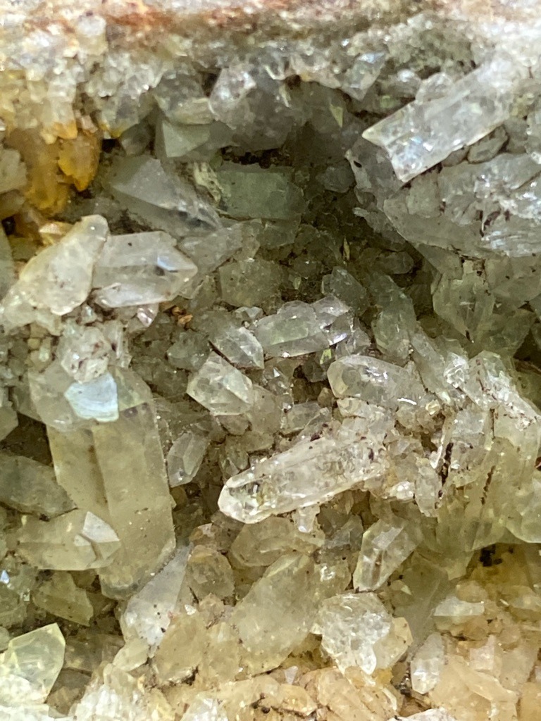 Not a diamond; the image shows a mineral geode or cluster consisting of natural quartz crystals (silicon dioxide). - Rough crystal habit, predominantly prismatic terminated quartz crystals.