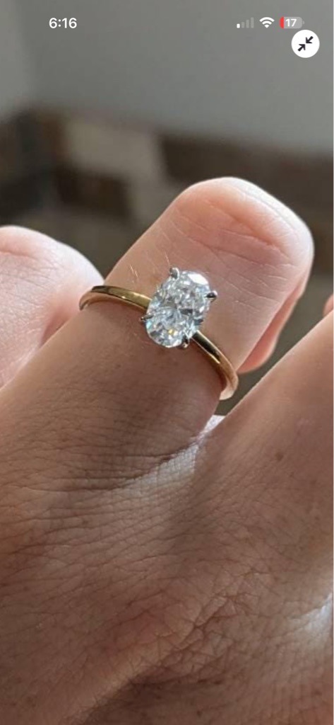 Natural or Lab-Grown Diamond (requires microscopic testing for definitive distinction) - Oval Brilliant