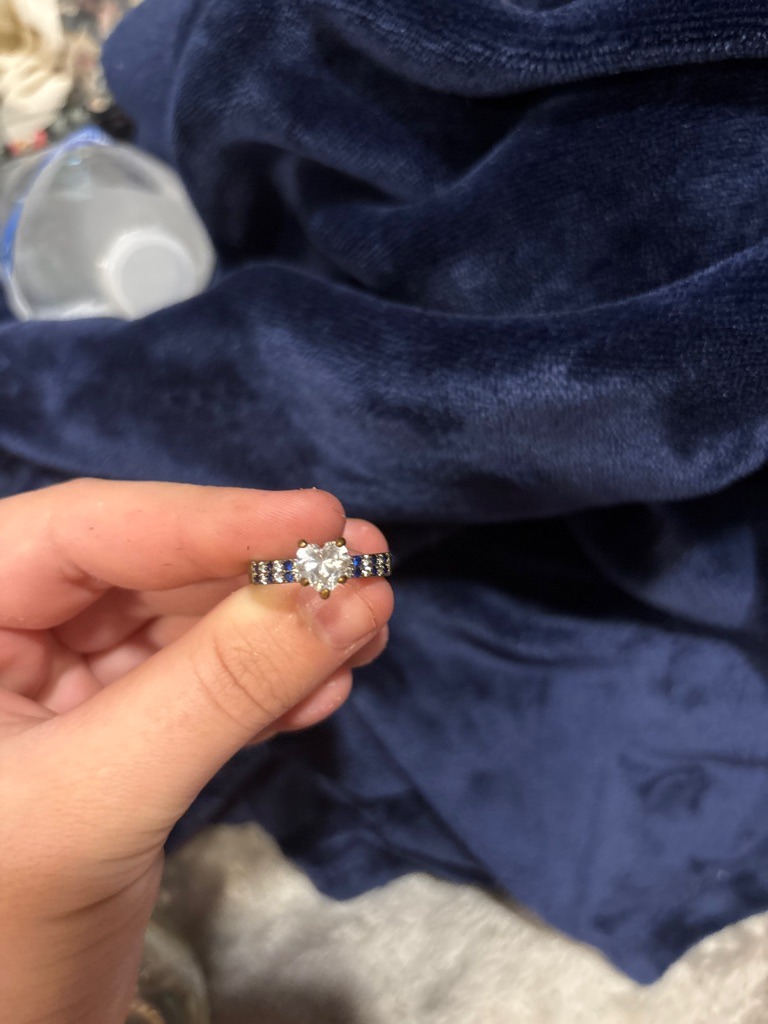 Natural Diamond (Assumed based on appearance) - Heart Brilliant