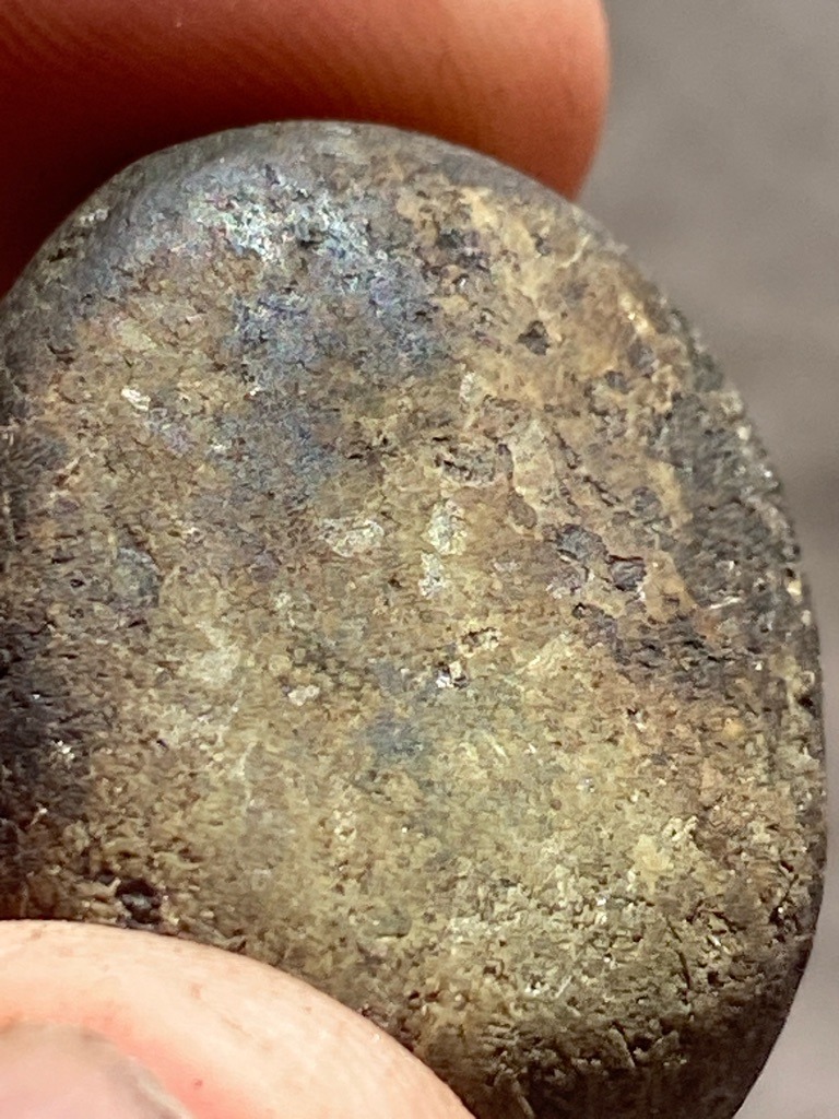 Not a diamond; this appears to be a rough mineral nodule, possibly pyrite, marcasite, or a weathered metallic-bearing rock, showing no gemological characteristics of a faceted or rough diamond crystal. - Rough irregular rounded nodule / pebble-like form; unpolished and uncut.