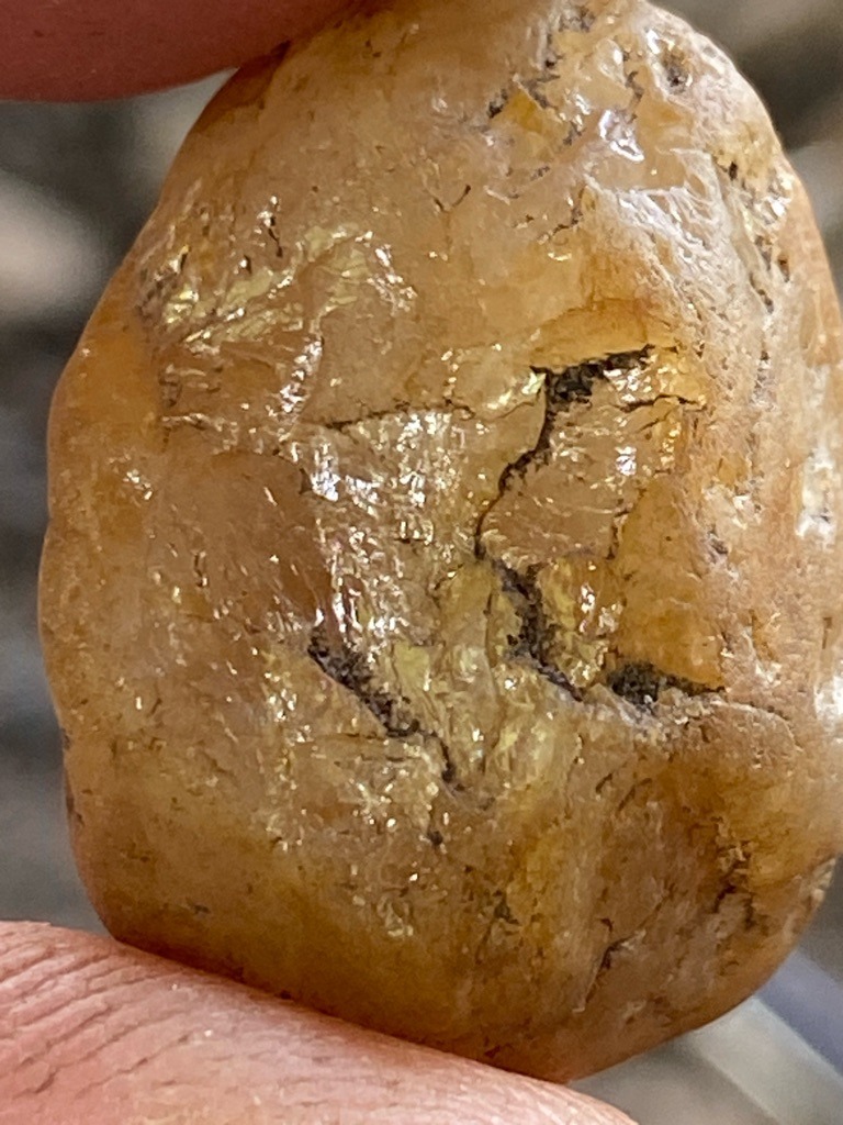 Natural rough industrial/gem-quality diamond (or potentially a heavily included diamond crystal/quartzite specimen, assuming diamond for this evaluation) - Rough, unpolished pebble/crystal form (Rounded / Irregular)