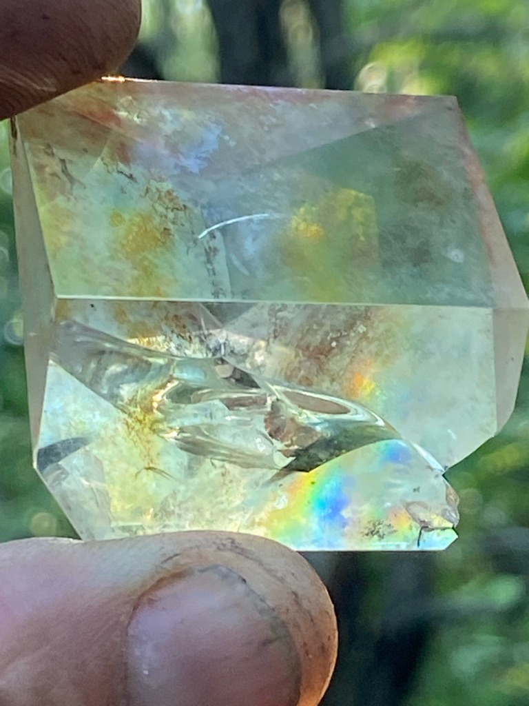 Not a diamond; this is a faceted quartz crystal, possibly quartz with inclusions or a glass simulant, but visually identifiable as a quartz mineral specimen rather than carbon diamond. - Custom carved rectangular block / tabular crystal form
