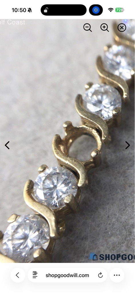 Natural Diamond (indicated by standard commercial-grade tennis bracelet mounting) - Round Brilliant