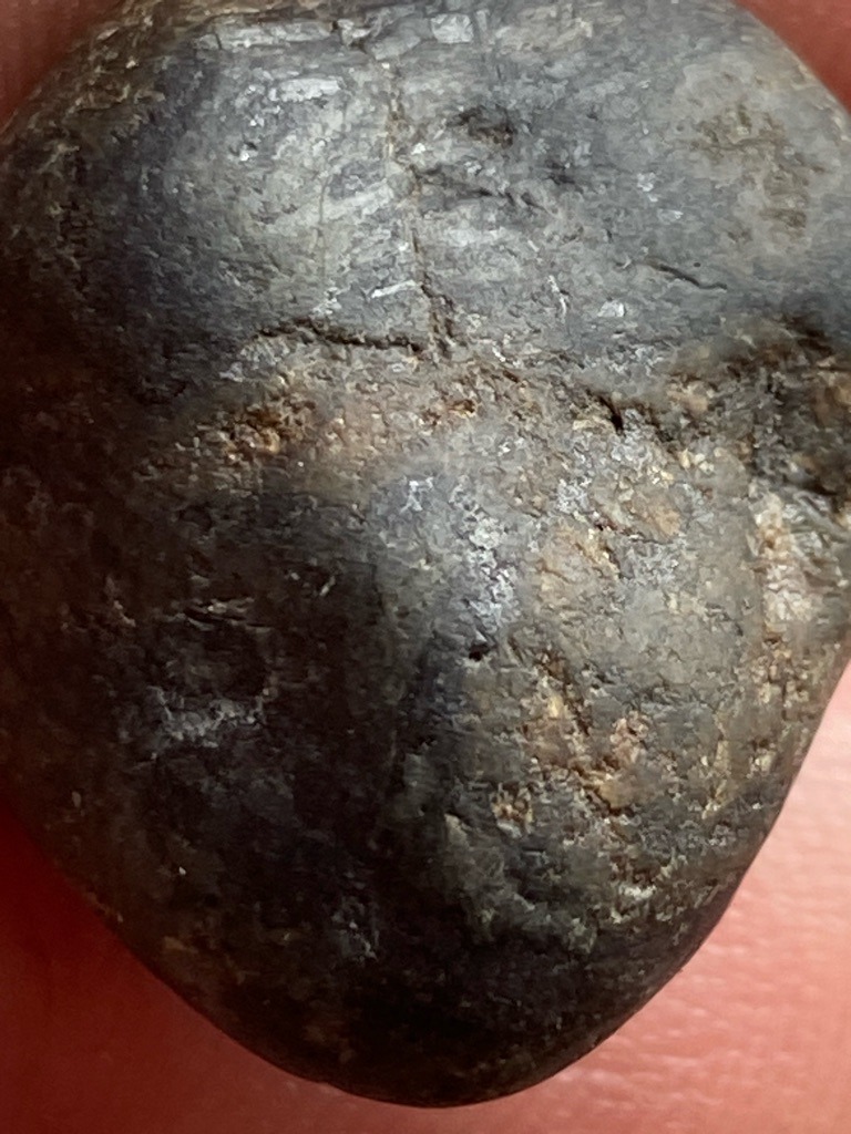 Not a diamond; this appears to be a natural rock, pebble, or mineral aggregate (possibly containing quartz or feldspar), showing no characteristic crystal faces or diamond morphology. - Irregular / Raw natural pebble