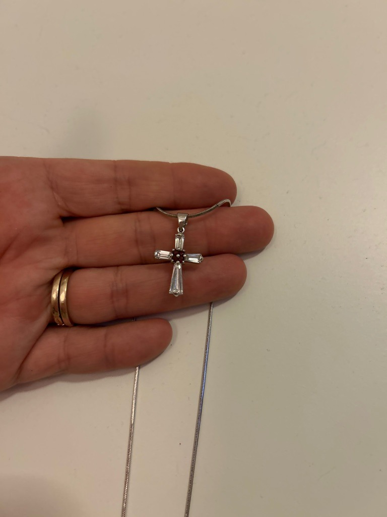Natural Diamond (or potentially Diamond Simulants given mounting context, assuming fine jewelry standard) - Baguette Cut