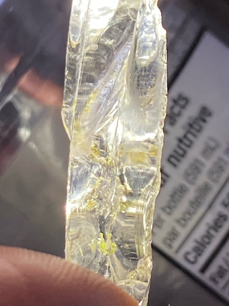 Not a diamond; this specimen appears to be raw quartz, resin, or industrial crystal waste rather than gemstone diamond. - Rough / Uncut elongated crystal form