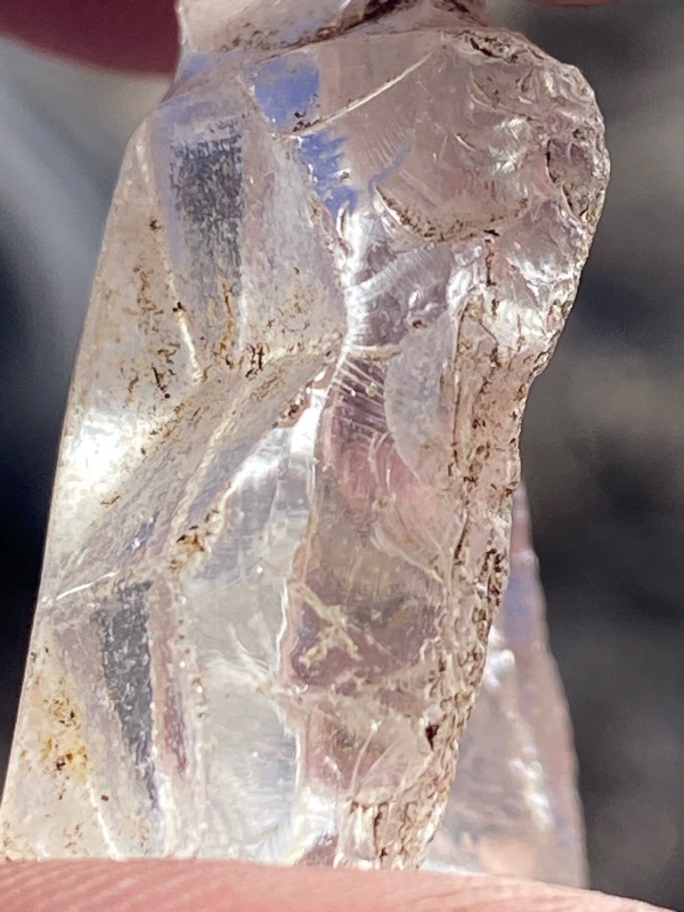 Natural rough crystal / mineral specimen (appears to be unpolished quartz or rough diamond crystal, featuring natural conchoidal fracture patterns) - Rough crystal / Irregular uncut form