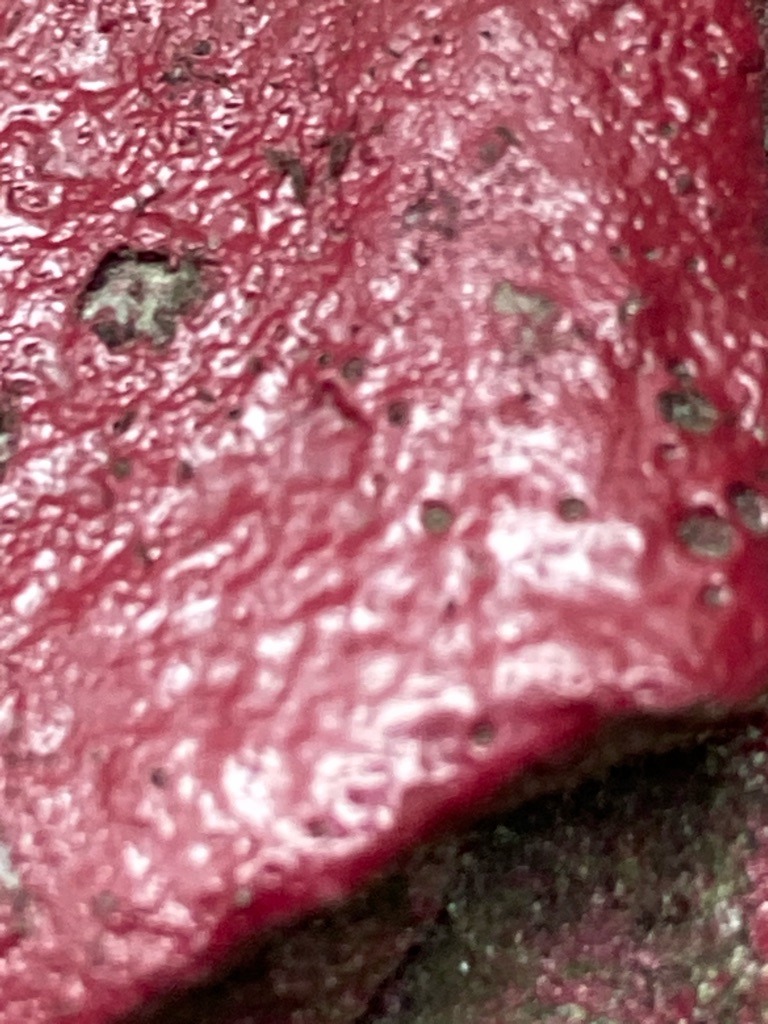 Not a diamond (appears to be a textured, painted, or coated non-gemstone surface) - Irregular / Undetermined