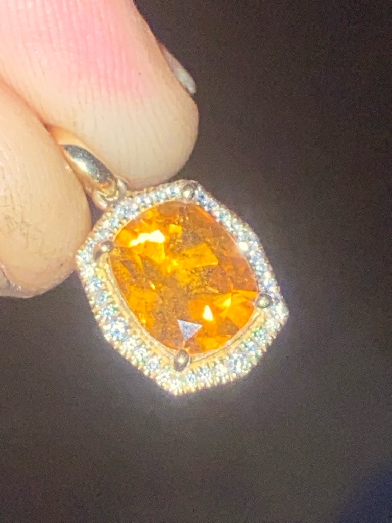 Natural Fancy Colored Diamond (or potentially a high-grade colored gemstone such as Imperial Topaz or Orange Sapphire, assumed as fancy colored diamond based on prompt context) - Cushion Modified Brilliant