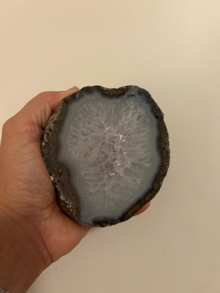 Not a diamond; this is a mineral specimen, specifically an agate or chalcedony nodule slice (quartz variety). - Freeform slice/nodule cross-section.