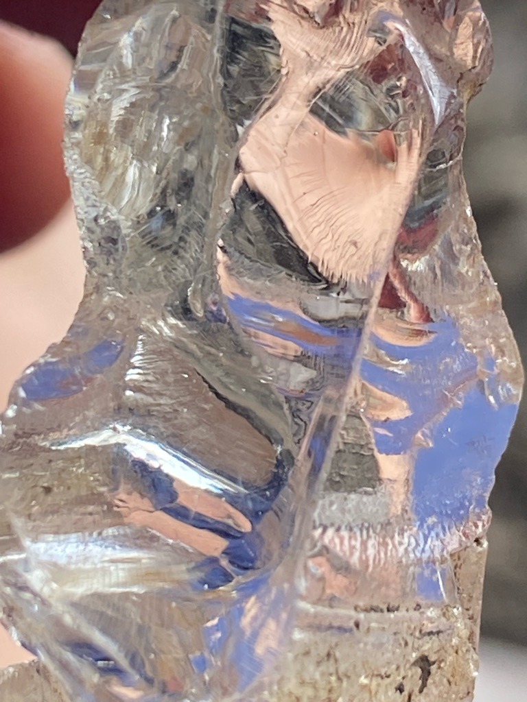 Not a diamond; appears to be raw quartz, glass slag, or another silicate mineral exhibiting conchoidal fracture - Rough / Raw irregular chunk with conchoidal fractures