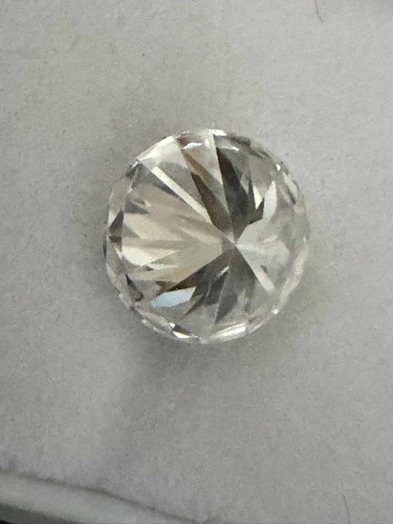 Likely Diamond (Natural or Lab-Grown) or Moissanite - Round Brilliant