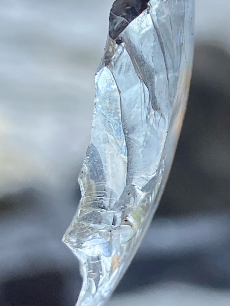 Natural rough mineral fragment, likely quartz or ice rather than gem-quality diamond - Irregular raw fragment, unpolished