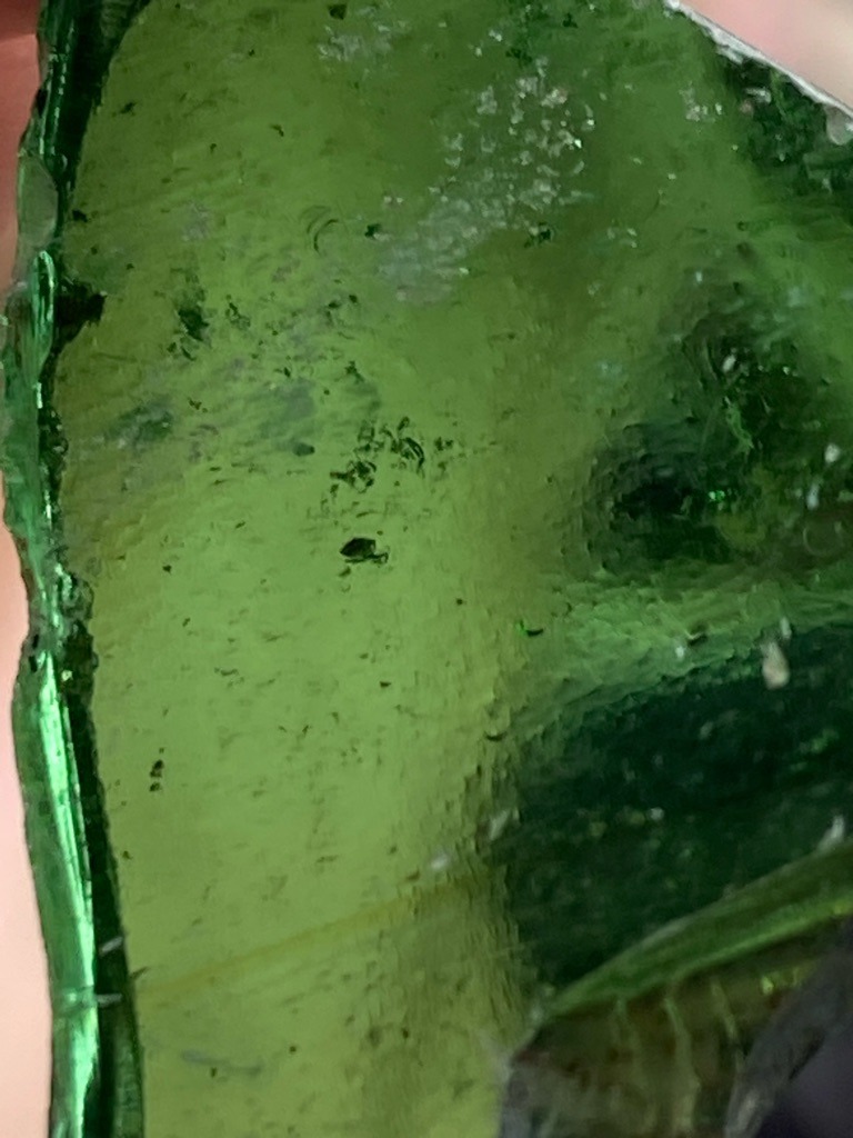 Not a diamond; appears to be raw green glass or slag material - Irregular raw chunk / Uncut fragment
