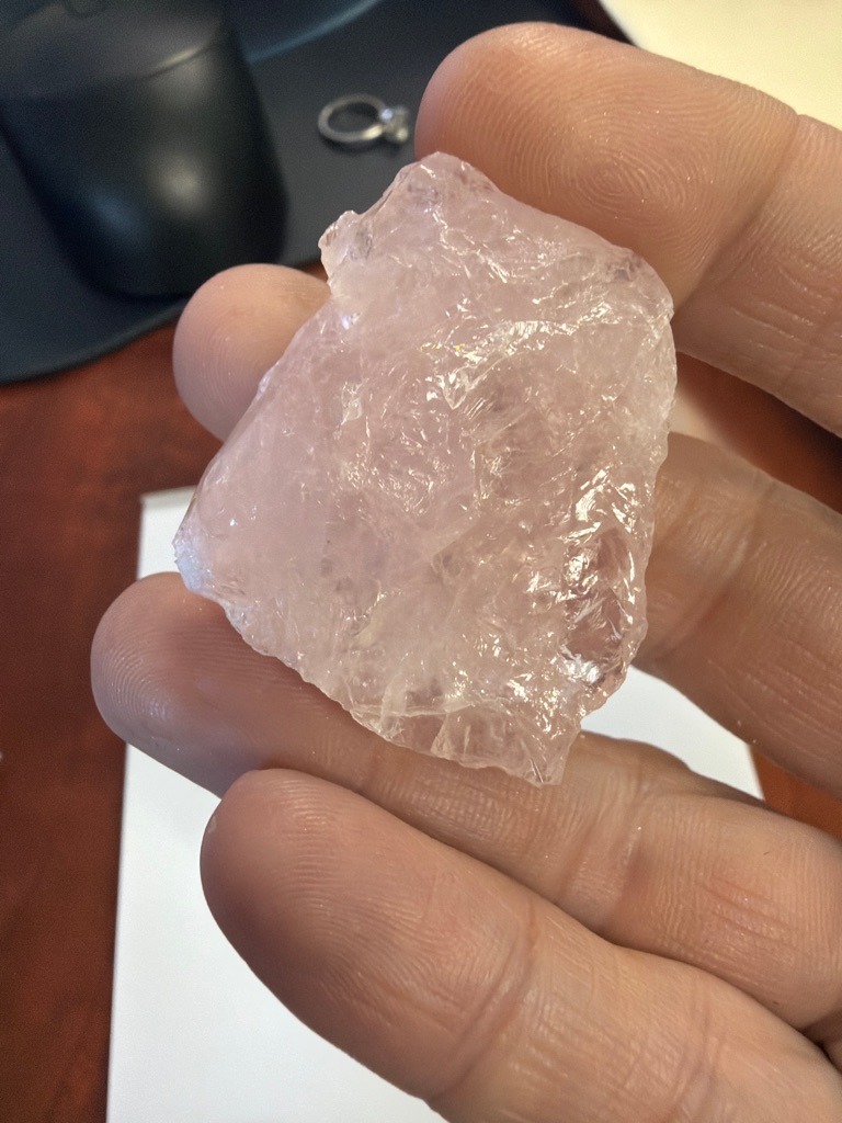Not a diamond; this is a raw, unpolished specimen of rose quartz (macrocrystalline quartz). - Raw, uncut, and unshaped rough crystalline chunk.