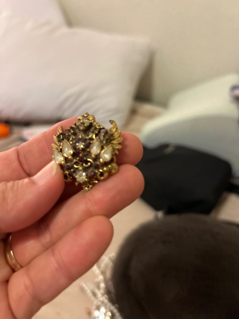 Not a diamond; the image shows vintage costume jewelry featuring paste glass stones, rhinestones, and faux pearls set in a metal double-headed eagle motif brooch. - Mixed (Round, Pear/Cabochon faux stones)