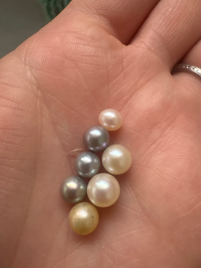 Not a diamond; these are Pearls (likely Freshwater or Saltwater Cultured) - Round to Near-Round / Spherical
