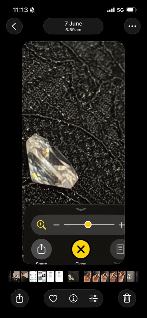 Indeterminate based on image, though visual dispersion suggests a potential stimulant like Cubic Zirconia or Moissanite - Round Brilliant (viewed in profile)