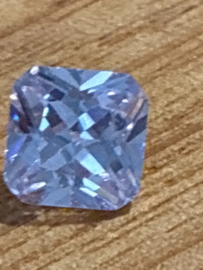 Likely Simulated (Cubic Zirconia or High-Grade Stimulant) - Radiant Cut