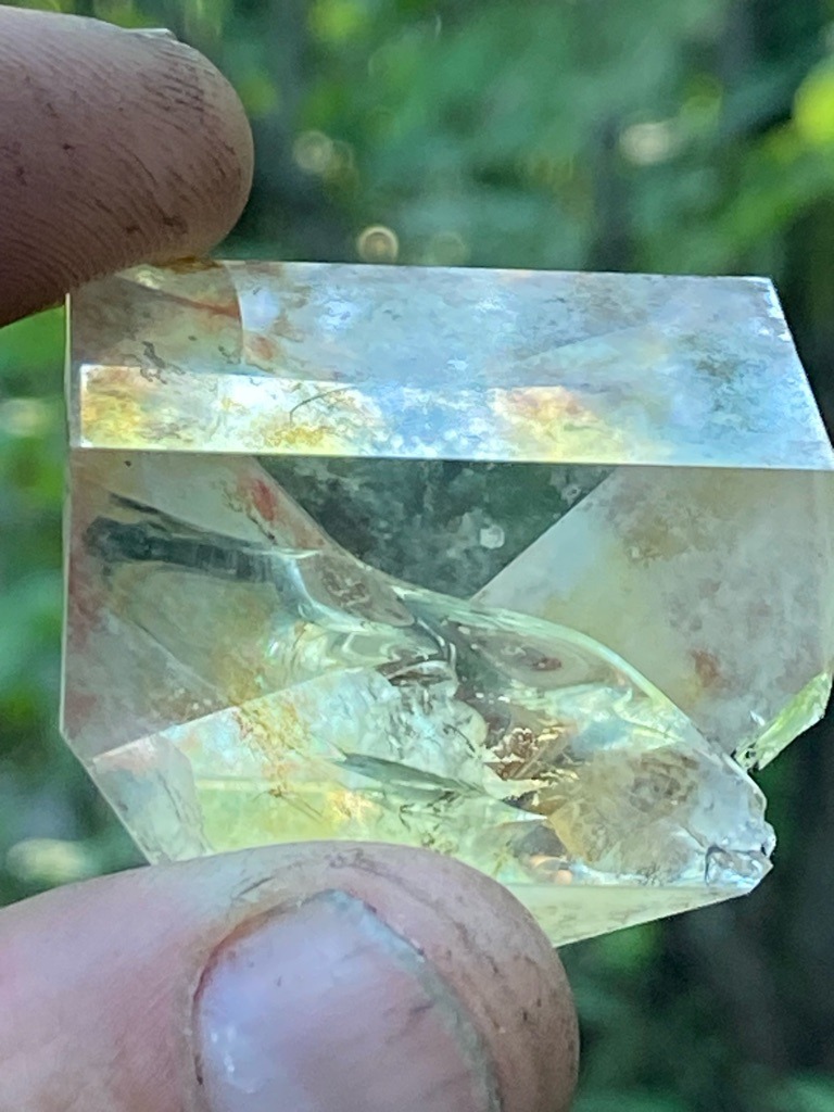 Natural quartz crystal with inclusion, commonly misidentified as diamond in rough forms, but this specimen appears to be a quartz variety (such as citrine or quartz with rutile/tourmaline inclusions) - Rough crystal / Partial tabular cut with natural crystal habit visible