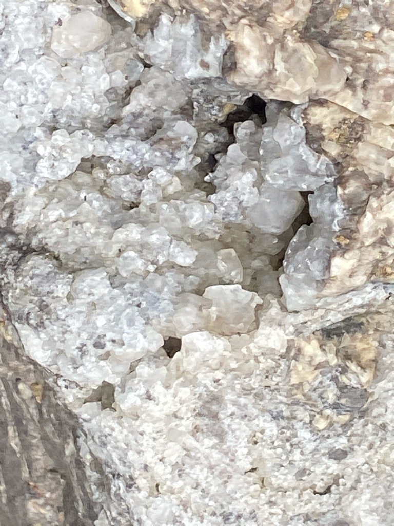 Not a diamond; raw mineral matrix, likely quartz or calcite geode formation - Rough crystalline aggregate