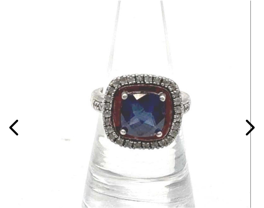 Natural (Surrounding melee diamonds) - Cushion Modified Brilliant (Center Stone) / Round Brilliant (Accent Stones)