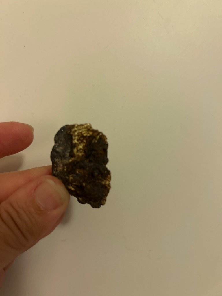 Not a diamond; this specimen appears to be a mineral aggregate or metallic ore matrix, possibly containing pyrite or gold-bearing rock. - Irregular raw nugget