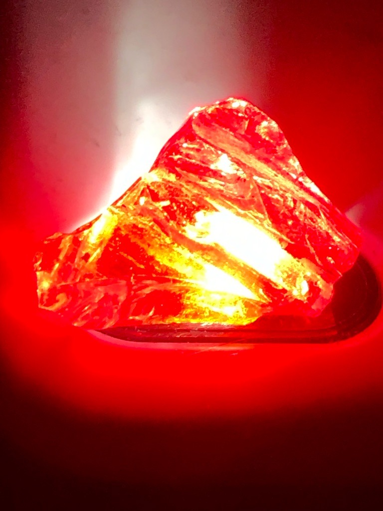 Natural rough stone, likely quartz or colored glass surrogate rather than true gem diamond - Rough crystal / Raw unpolished fragment