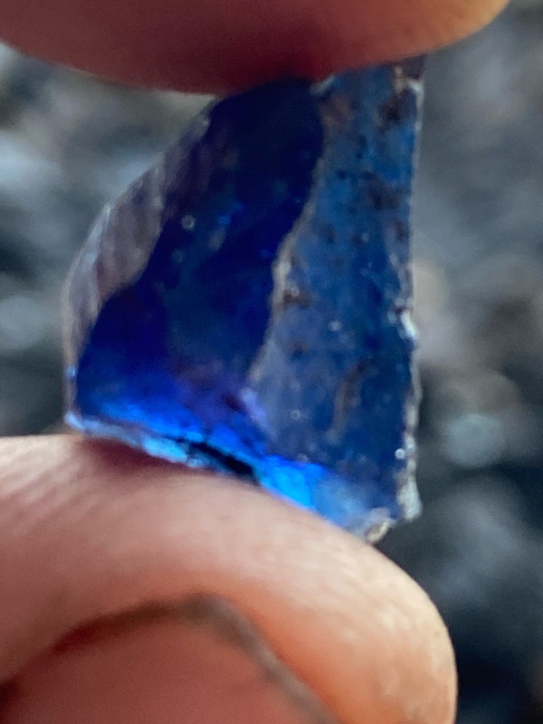 Not a diamond; appears to be a blue glass fragment or colored mineral rough - Rough fragment, unpolished