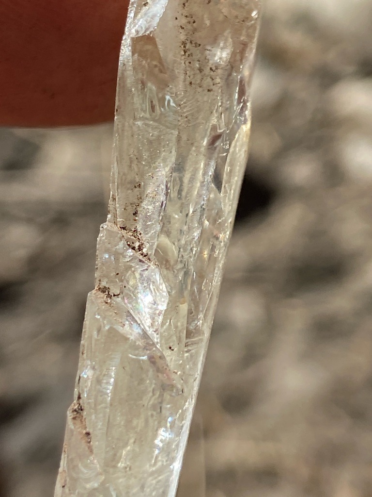 Natural rough crystal / mineral specimen (appears to be raw quartz crystal rather than a faceted diamond, given the habit and surface striations) - Rough crystal / Elongated prism