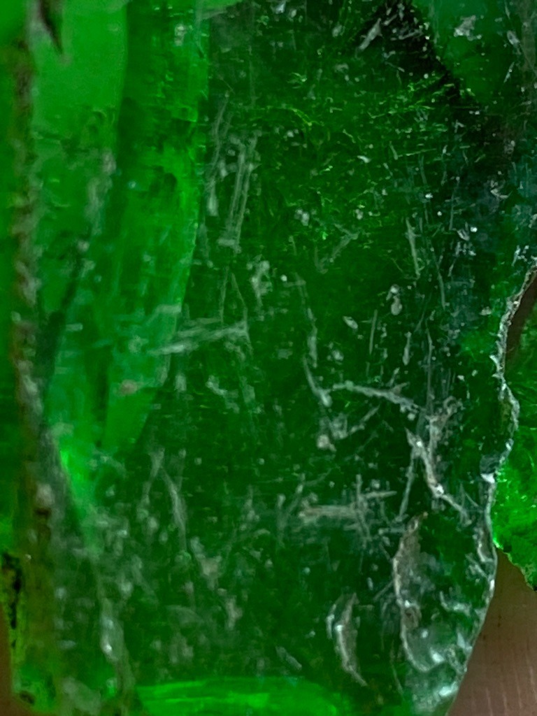 Not a diamond; this is a raw emerald or a green mineral specimen, potentially glass or beryl. - Rough crystal / Uncut crystal formation