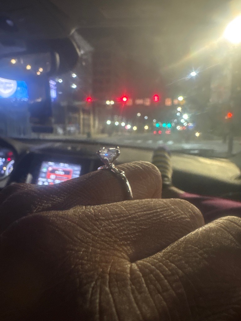 Natural Diamond (estimated based on context and brilliance) - Round Brilliant