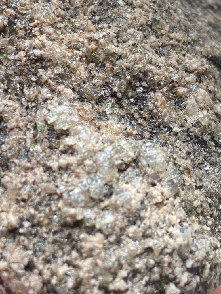 Not a diamond; the image shows a geological matrix, likely granite or pegmatite with quartz and feldspar grains. - Not applicable (rough, un-faceted mineral aggregates)