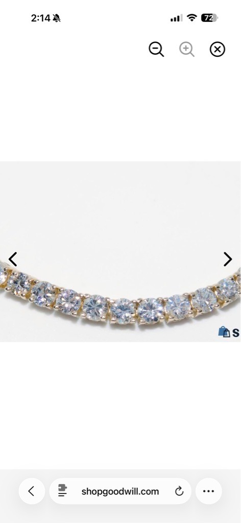 Natural Diamond (Typical for estate jewelry pieces found on reseller platforms like ShopGoodwill, though cubic zirconia or moissanite cannot be completely ruled out without physical testing). - Round Brilliant