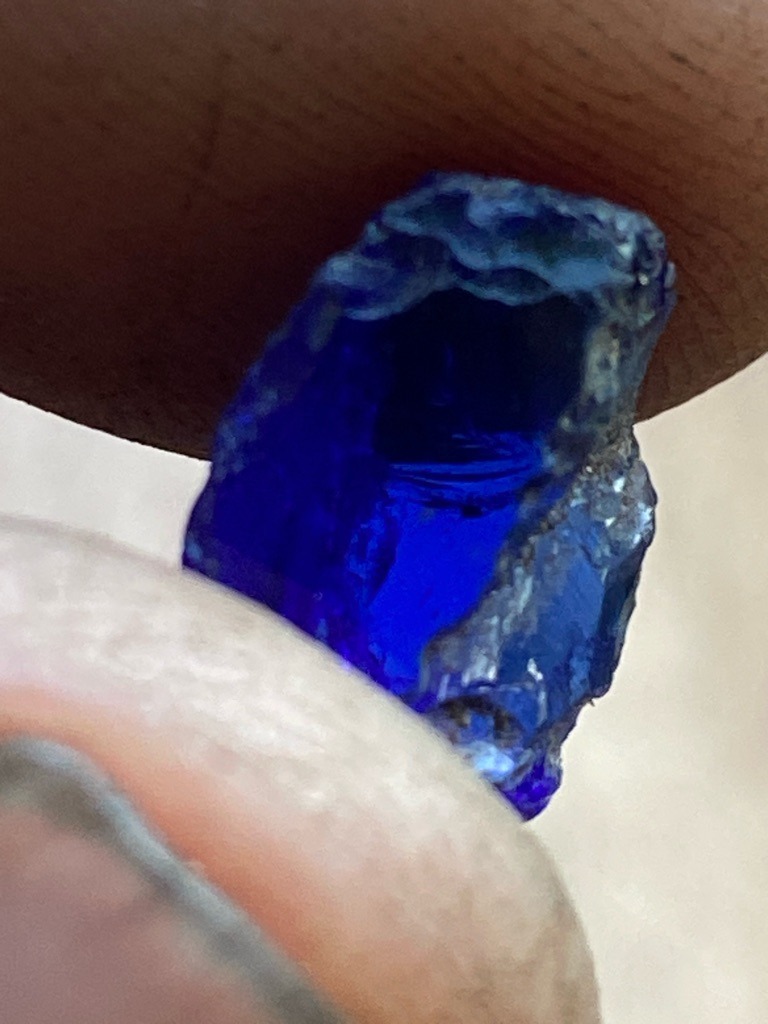 Not a diamond; this is a rough blue sapphire (corundum), displaying a natural deep blue color and crystalline rough structure. - Rough crystal / Uncut crystal formation with natural irregularities.