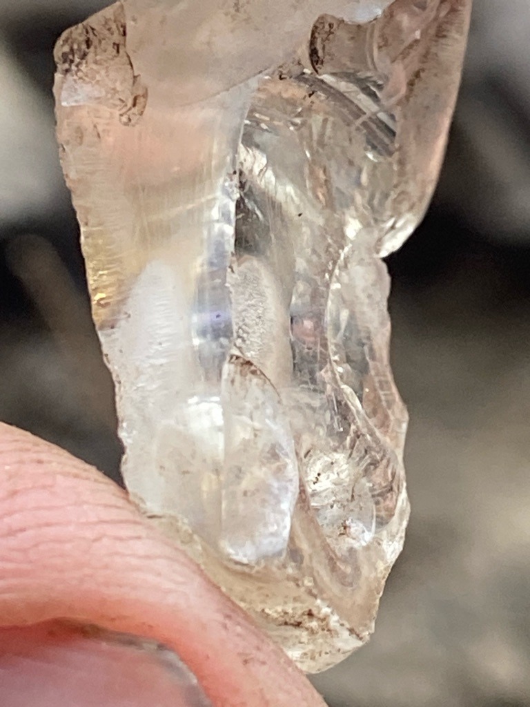 The image shows a raw, uncut mineral crystal rather than a faceted diamond; visually, it resembles rough quartz or similar pegmatite mineral, but if evaluated as a rough diamond specimen, it displays natural crystal growth features. - Rough Crystal / Raw Uncut Mineral