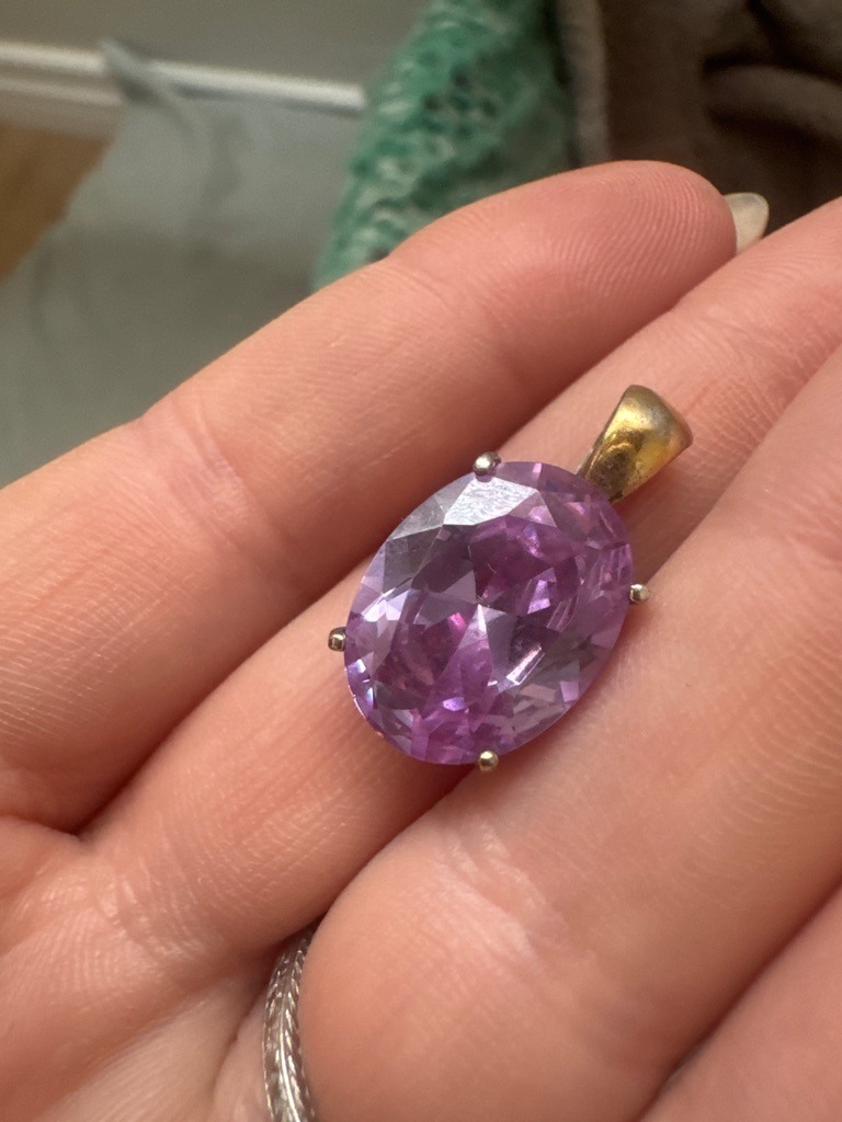 Likely Cubic Zirconia or Synthetic Amethyst (Simulant) - Oval Brilliant