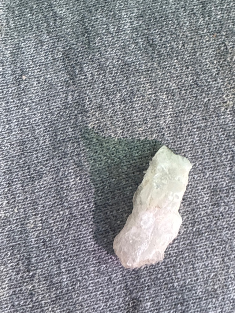 Rough natural crystal (likely quartz or low-grade diamond crystal) - Rough uncut crystal (elongated, irregular)