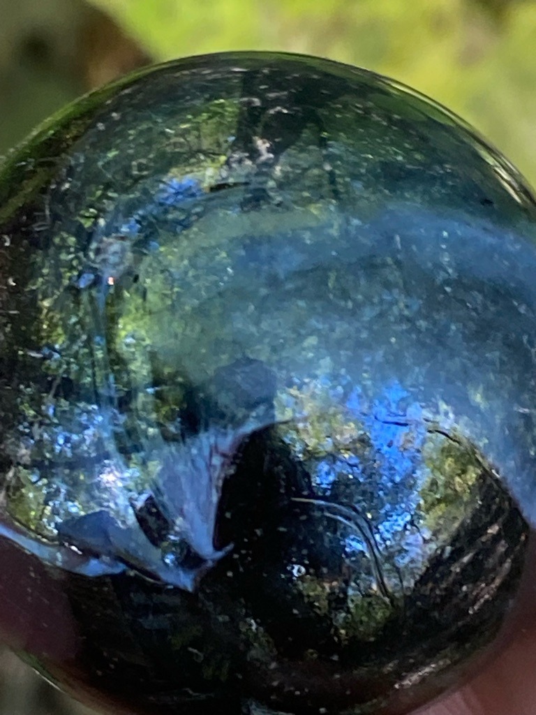 Not a diamond (appears to be a glass or mineral marble/sphere with inclusions) - Spherical / Globe