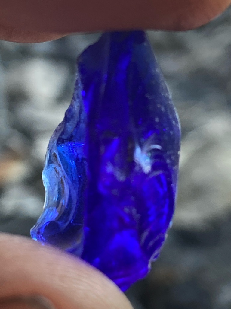Not a diamond; appears to be cobalt blue glass or rough slag/mineral fragment - Rough, unpolished, irregular fragment