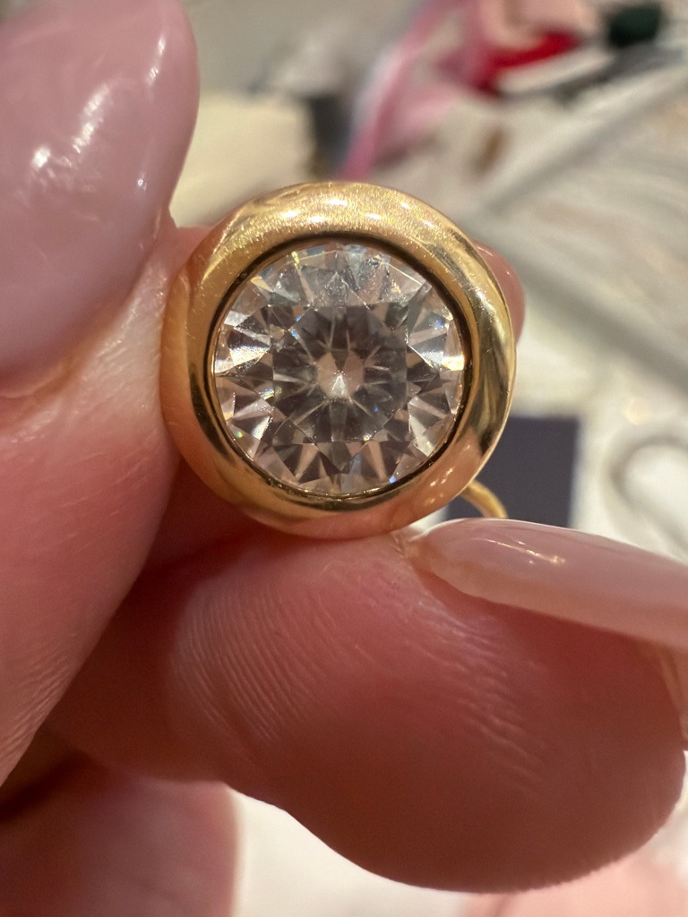Natural Diamond (or Lab-Grown, requiring advanced spectroscopic testing to differentiate definitively) - Round Brilliant