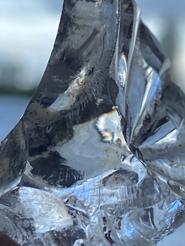 Not a diamond; appears to be raw quartz or glass slag - Uncut or heavily fractured raw crystal/irregular mass
