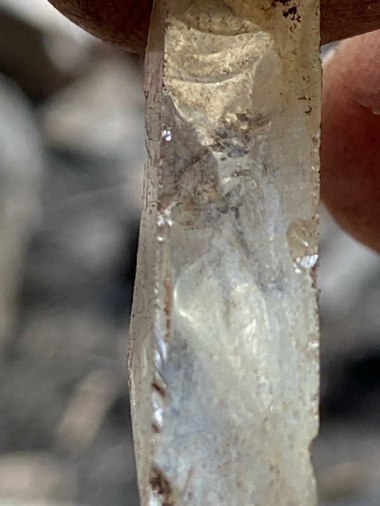 Natural rough mineral crystal, likely quartz or a low-grade industrial diamond specimen - Rough crystal elongation with natural faces