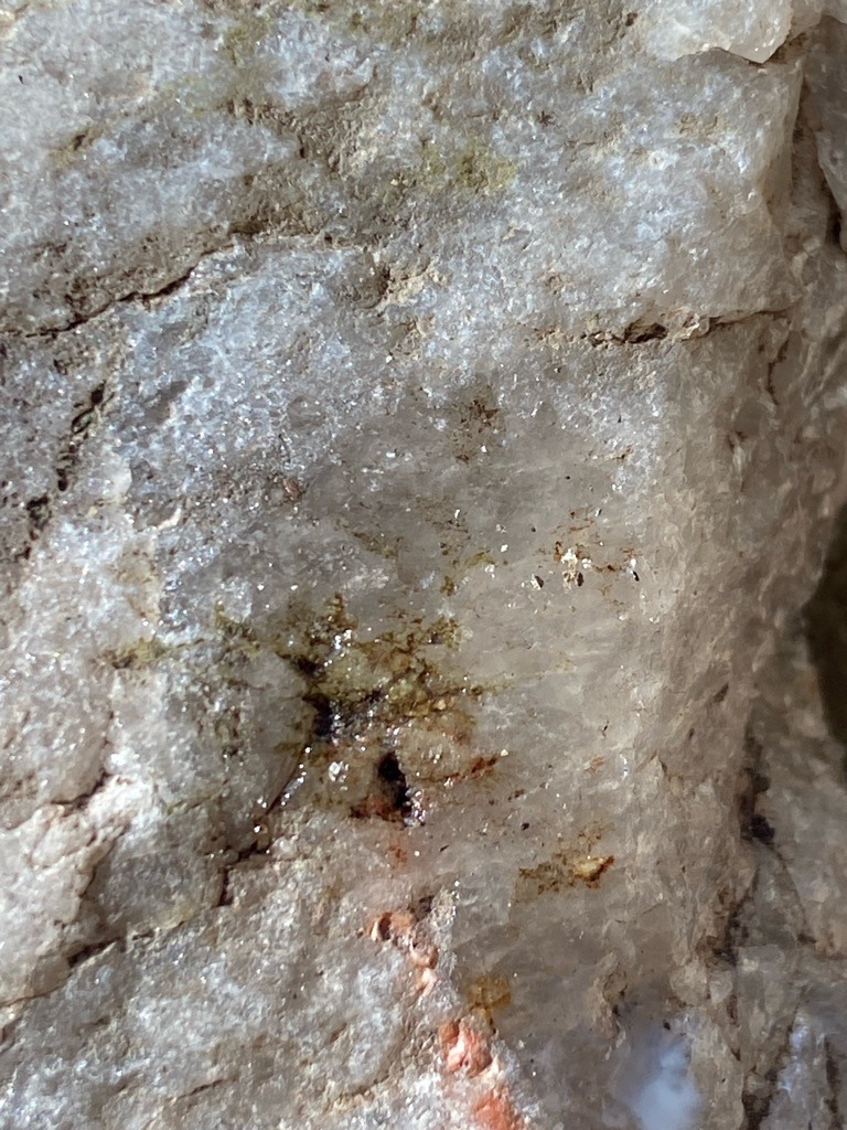 Not a diamond; this image depicts rough crystalline quartz or quartzite rock with mineral inclusions, not a faceted gemstone or diamond. - Rough/Uncut Matrix