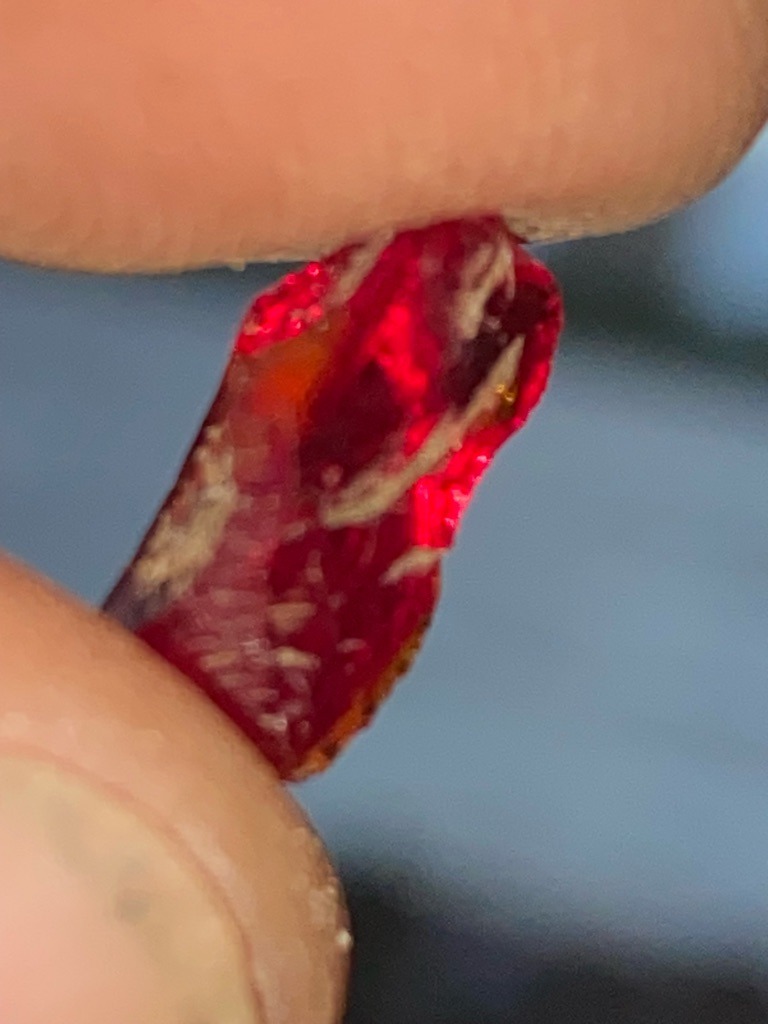 Not a diamond; this specimen appears to be a natural rough corundum (ruby) or possibly a garnet crystal, characterized by its deep red color and raw crystal habit. - Raw, uncut, or partially fractured rough crystal form