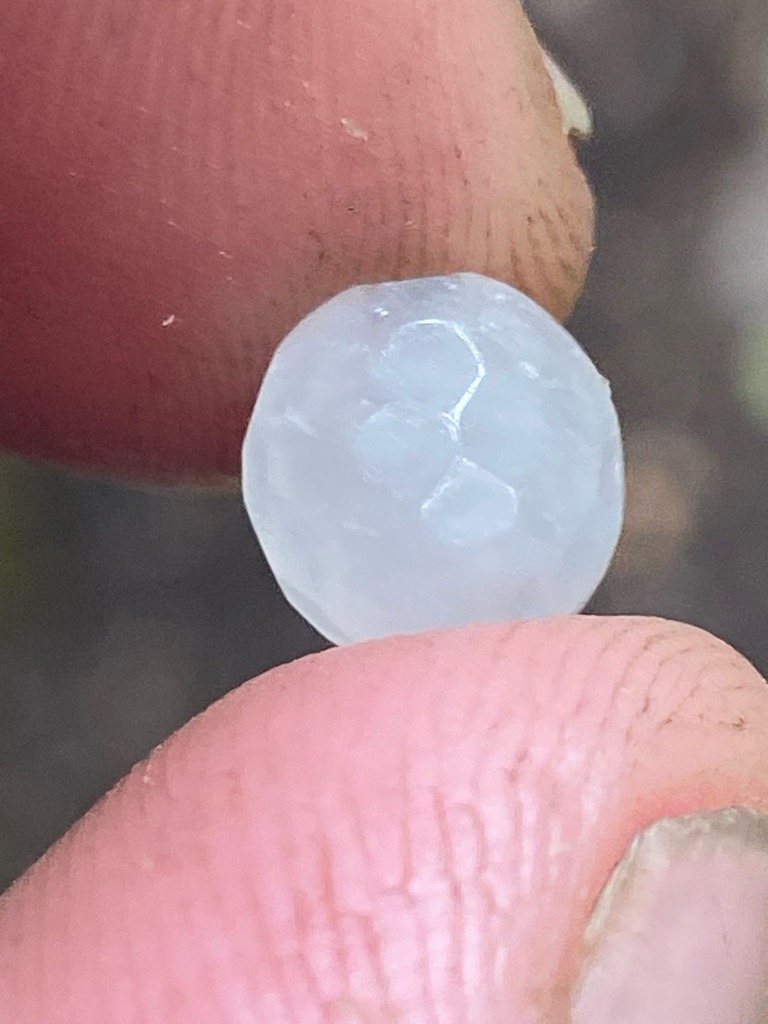 Natural rough diamond - Uncut crystal, heavily rounded or tumbled pebble form with natural curved faces