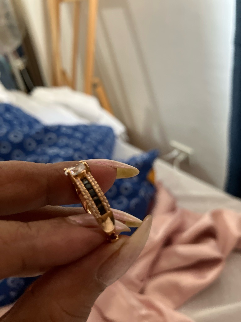 Likely Moissanite or High-Quality Cubic Zirconia - Emerald Cut or Radiant Cut