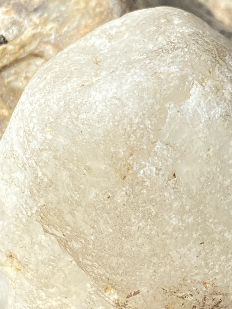 Not a diamond; appears to be a rough quartz pebble or chalcedony in its natural, unpolished state - Irregular / Raw water-worn pebble