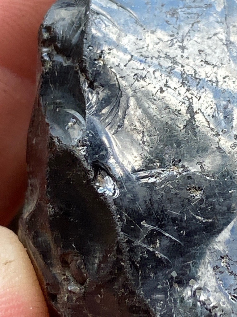 Not a diamond; this is a raw mineral sample, likely raw silicon, slag glass, or another heavy industrial material showing conchoidal fracture, not carbon allotrope crystal. - Rough / Raw Uncut Mass
