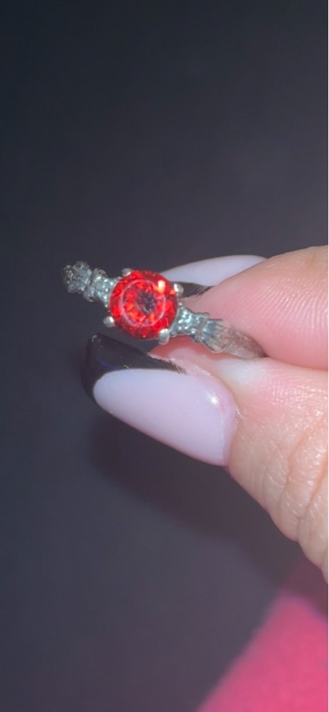Natural Colored Diamond (or potentially treated Red Diamond / Ruby gemstone, visual analysis suggests Fancy Intense Red) - Round Brilliant